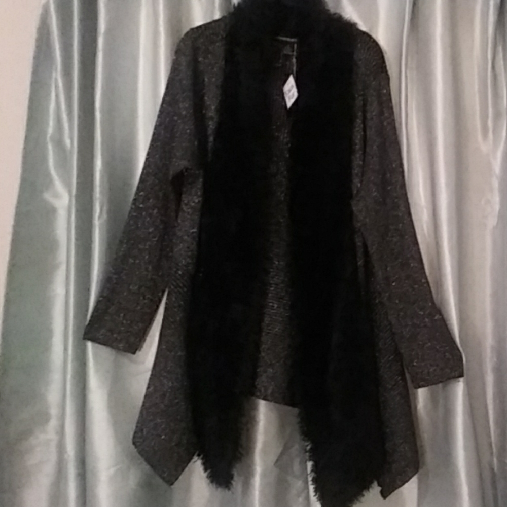 Cape like sweater